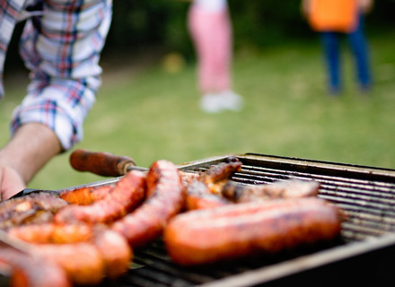 lots of Smokies on the BBQ grill